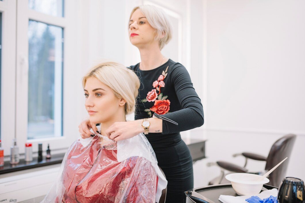 woman-preparing-young-girl-hair-treatment_23-2147769751